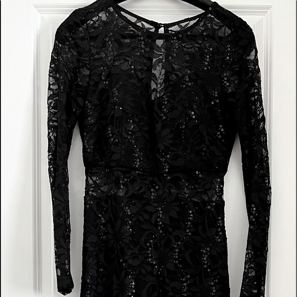 GORGEOUS Long formal dress shows just the right amount of skin through the lace!